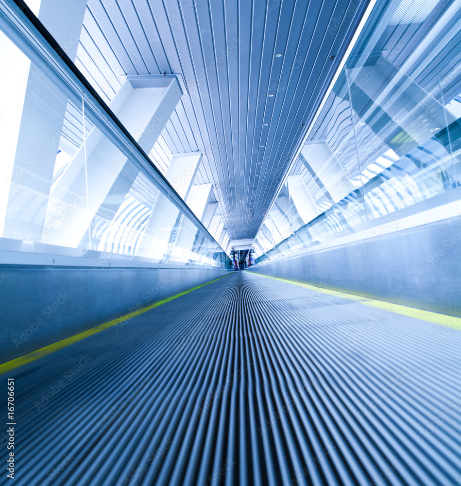 Obraz premium moving blue escalator