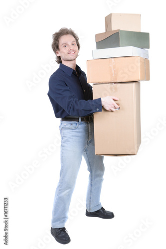 man carrying a pile of cardboard boxes