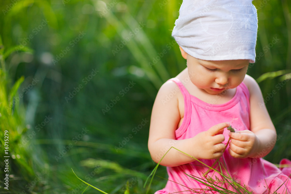 Little girl in meadow