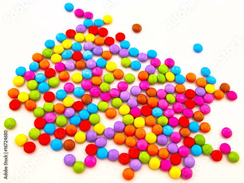 Multi-coloured chocolate candy on a white background © kelley