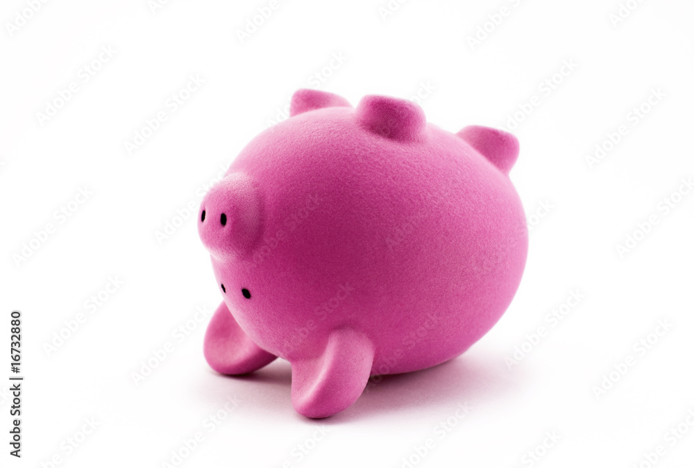 Pink piggy bank upside down