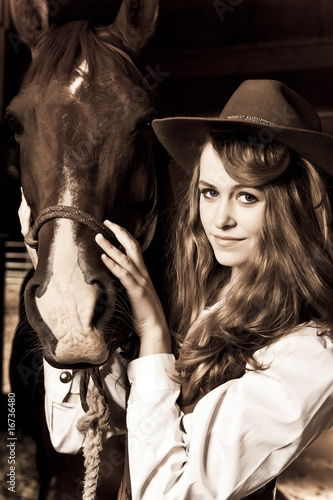 Beautiful girl with her horse © arekmalang