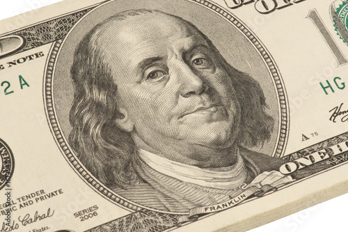 Close up of Franklin's portrait on one hundred dollar's banknote