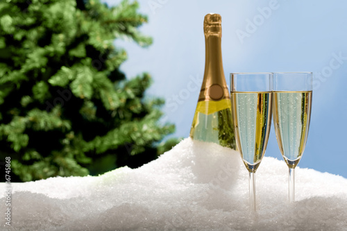 Champagne flutes in snow