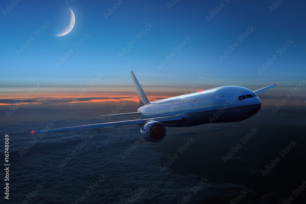 Airplane in the sky at night Airplane in the sky at night