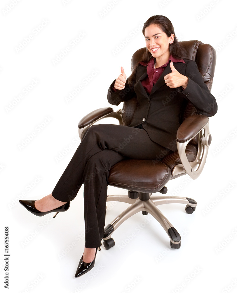 Businesswoman Sitting on a Leather Chair with Thumbs Up Businesswoman Sitting on a Leather Chair with Thumbs Up