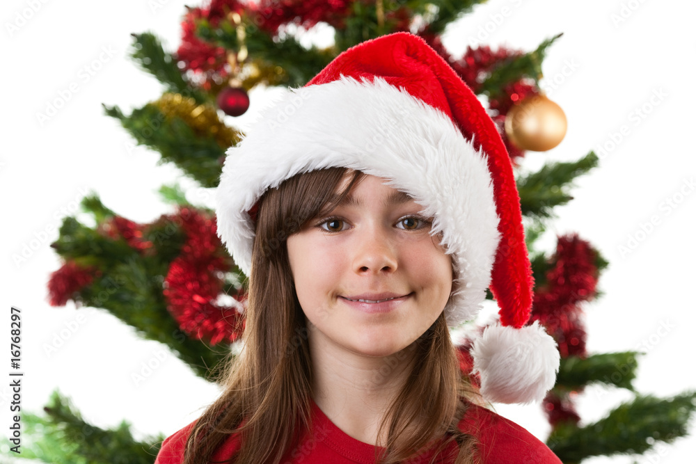 Girl wearing Santa Claus hat isolated on white Girl wearing Santa Claus hat isolated on white