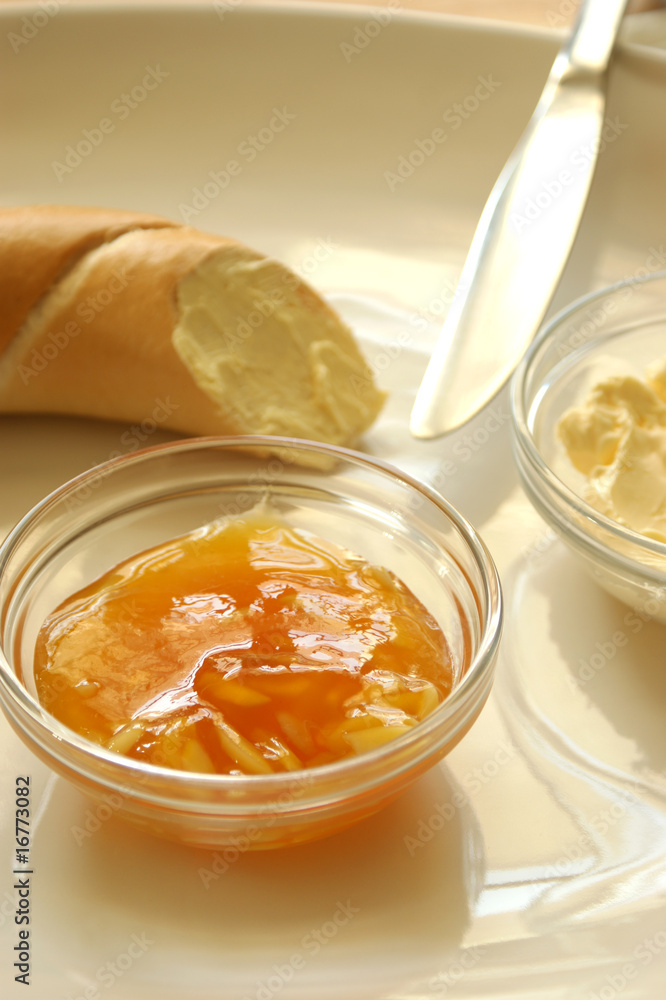 yellow plum marmelade and some french roll yellow plum marmelade and some french roll