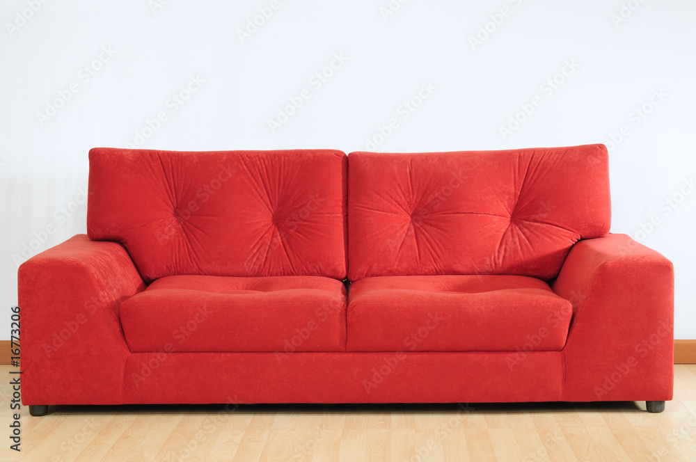 Red sofa. Stock Photo Adobe Stock