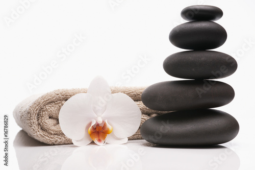 spa stones towel and orchid