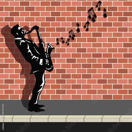 Busker playing the saxophone in the street