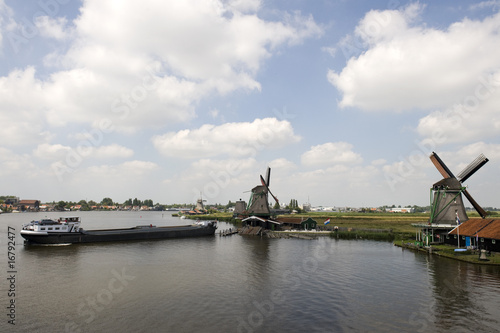 Dutch windmill on a canals edge