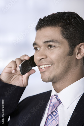 Portrait of businessman on phone