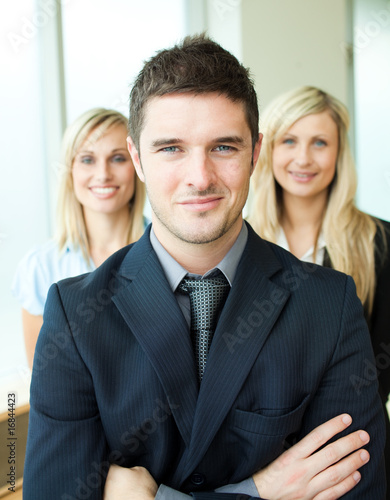 Portrait of three young business people