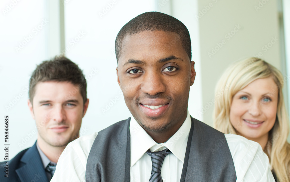 Portrait of an Afro-American businessman with his colleagues Portrait of an Afro-American businessman with his colleagues