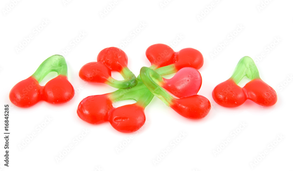 candy in the shape of cherries over white background candy in the shape of cherries over white background