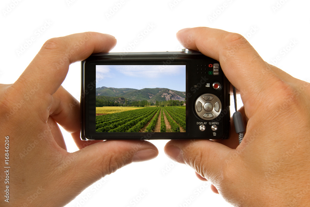 Hands with digital photo camera taking picture Hands with digital photo camera taking picture