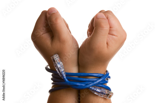 Hands tied with network cable.