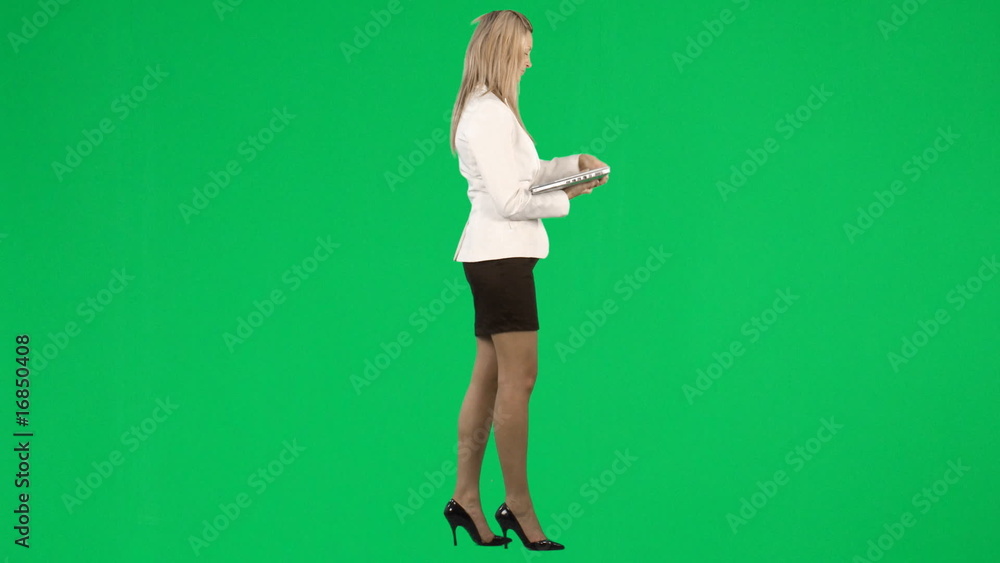 Businesswoman holding a laptop Businesswoman holding a laptop