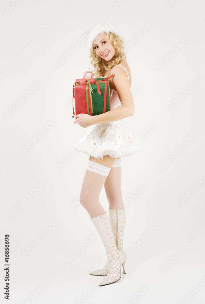cheerful santa helper girl with gift box cheerful santa helper girl with gift box