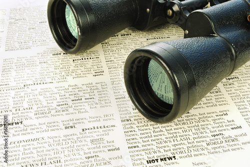 black binoculars and news