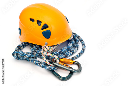 climbing equipment - carabiners, helmet and blue rope