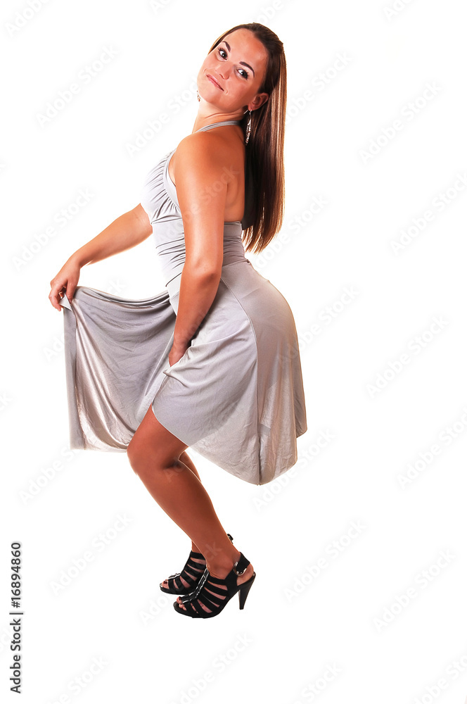 Naklejka premium Pretty girl in silver dress.
