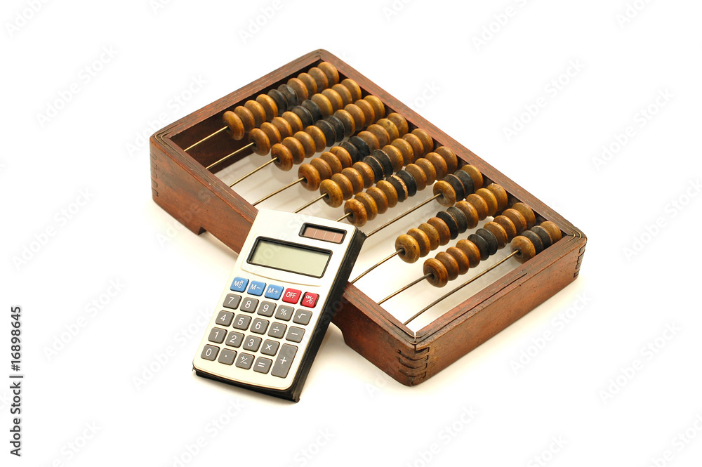 Abacus and calculator on white background Abacus and calculator on white background
