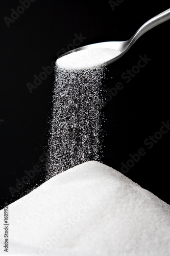 Sugar Spilling from Spoon
