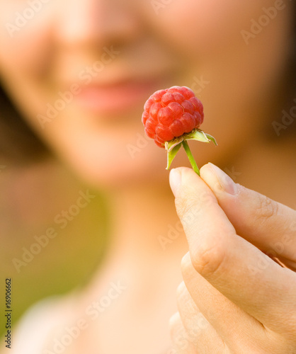 berries in girl's hand