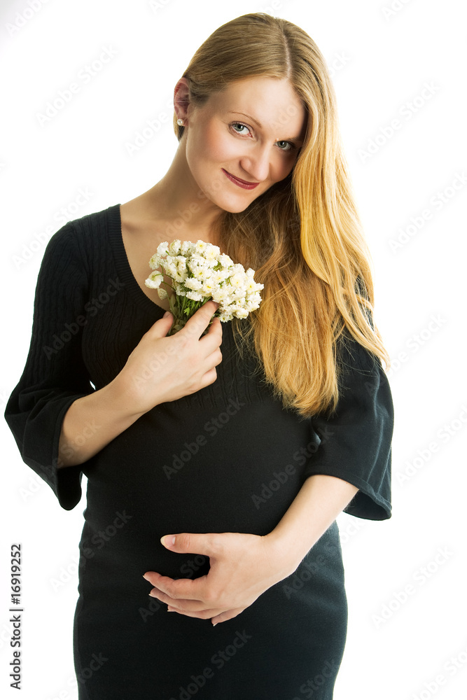 smiling pretty pregnant blonde with flowers isolated on white smiling pretty pregnant blonde with flowers isolated on white