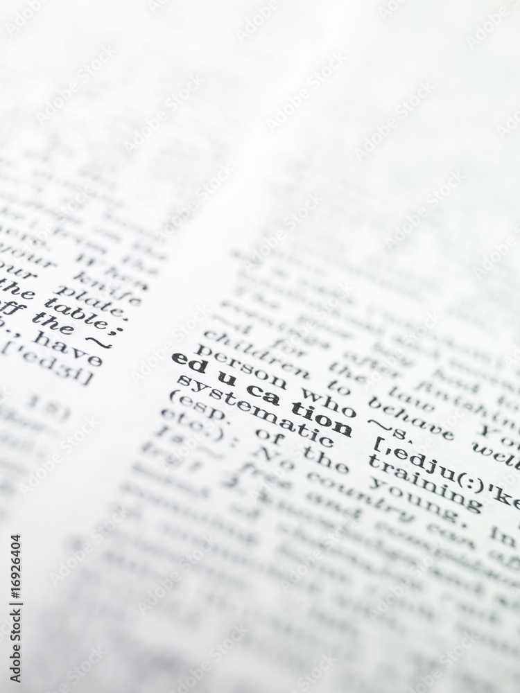 the word 'education' highlighted in a dictionary the word 'education' highlighted in a dictionary