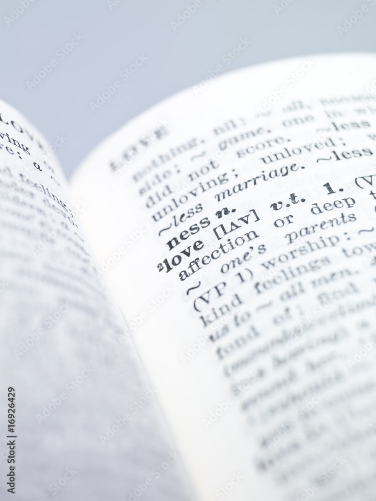 the word 'love' highlighted in a dictionary the word 'love' highlighted in a dictionary