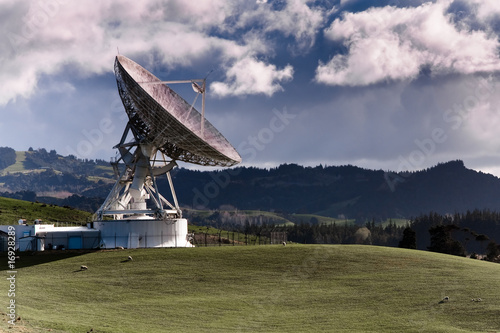 Satellite station on farmland. photo