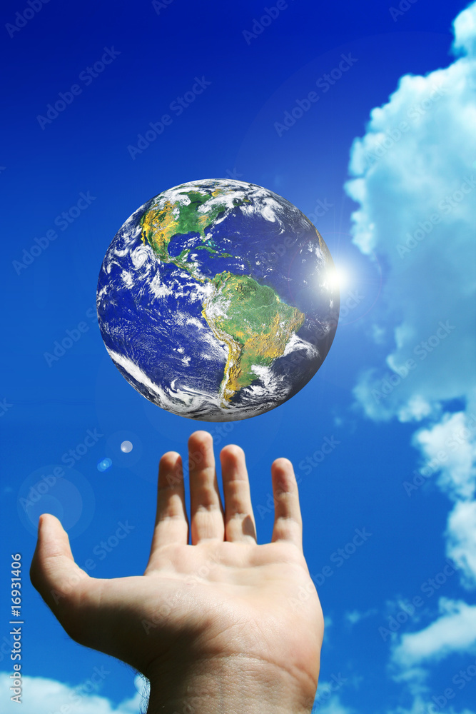 globe of planet earth above a man hand globe of planet earth above a man hand