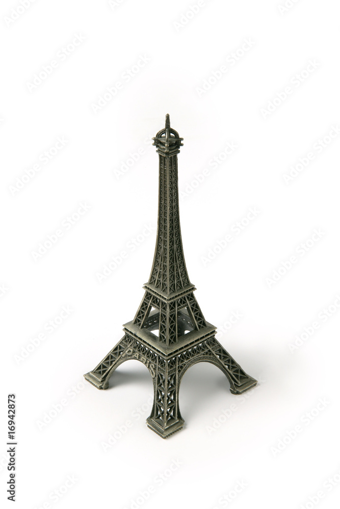 Tour Eiffel en miniature sur fond blanc