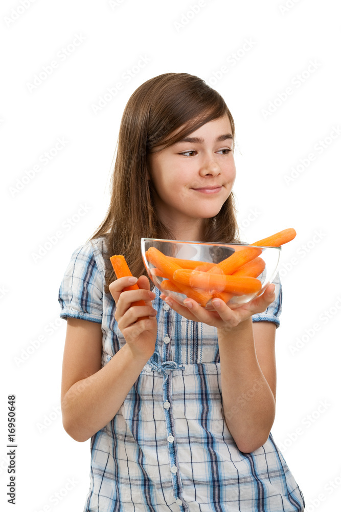 Girl holding fresh carrots isolated on white background Girl holding fresh carrots isolated on white background