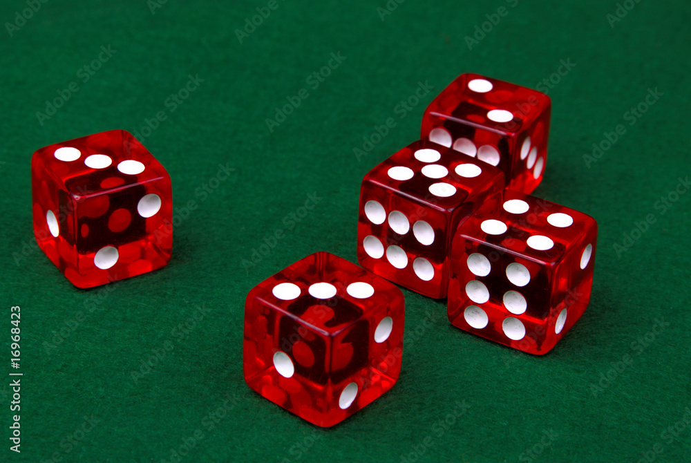 Five dice on a green background Five dice on a green background