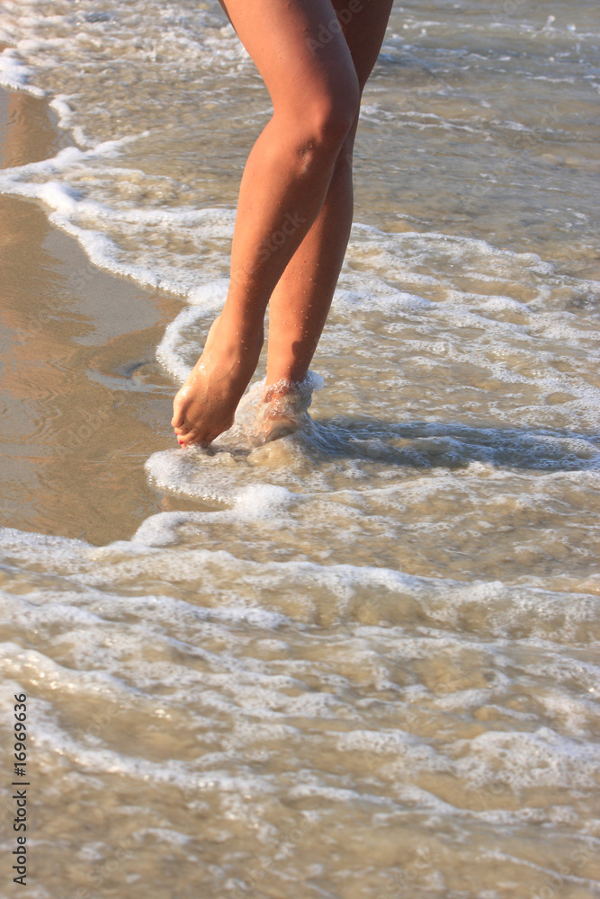 girl walking in water girl walking in water
