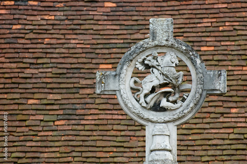 st george and dragon against a tiled roof background