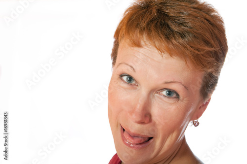The woman shows tongue