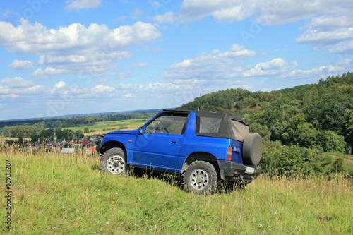 Off-road. 4x4 jeep at the top of a hill © remik44992