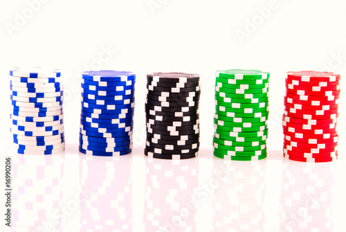 Stacks of poker chips on white