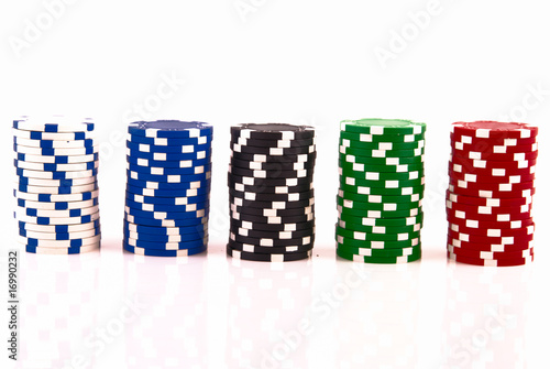 Stacks of poker chips on white
