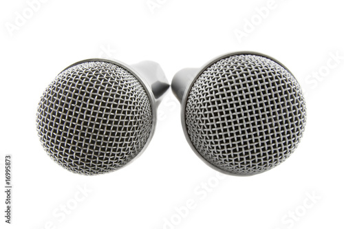 Two silver microphones isolated over white background;