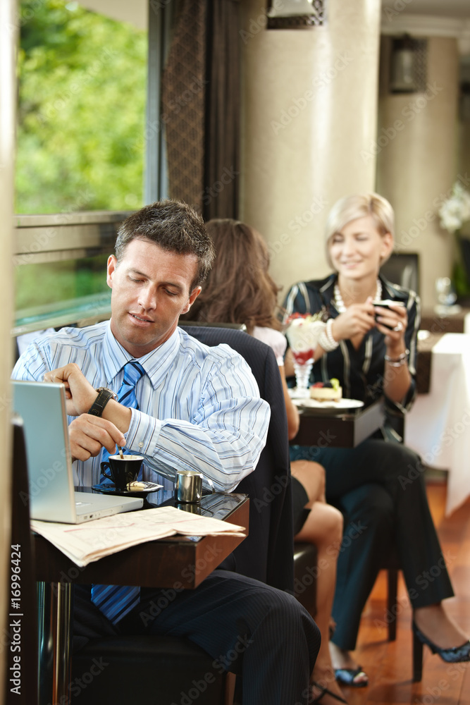 Businessman waiting in cafe Businessman waiting in cafe