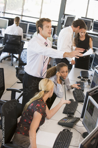 Bilde på lerret High Angle View Of Stock Traders At Work