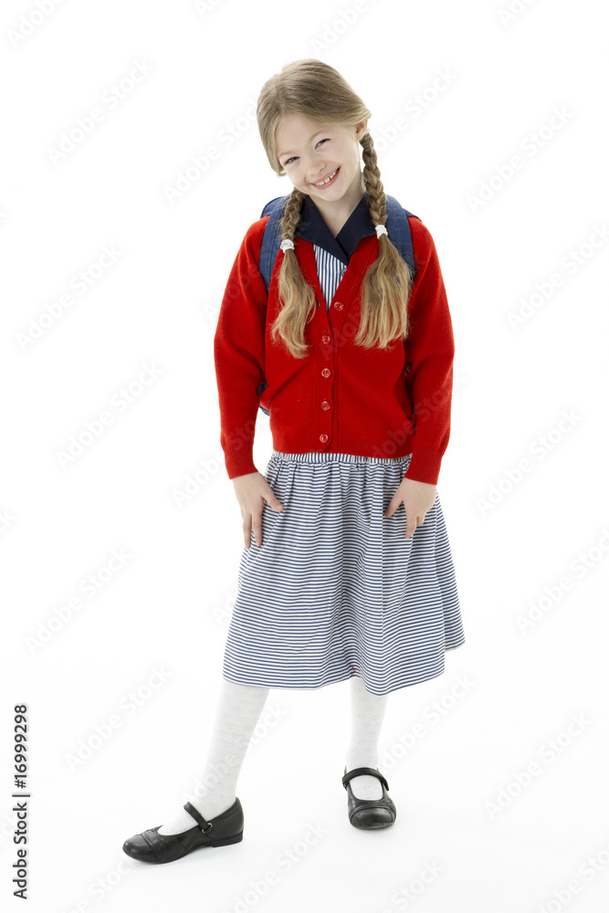 Studio Portrait of Smiling Girl Wearing School Bag Studio Portrait of Smiling Girl Wearing School Bag