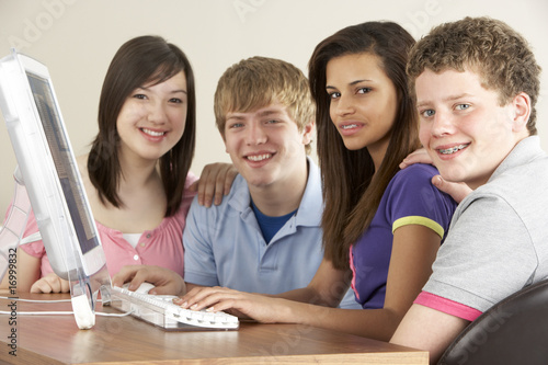 Teenagers on Computer at Home