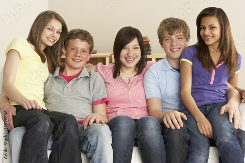 Teenage Friends Relaxing at Home